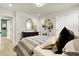 Inviting bedroom with light walls, a floral accent wall, and neutral-toned decor at 4052 Saddle Club S Pkwy, Bargersville, IN 46106