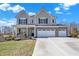 Charming two-story home featuring a three-car garage and well-manicured front lawn at 4052 Saddle Club S Pkwy, Bargersville, IN 46106