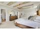 Bright, spacious main bedroom features tray ceiling with decorative beams, modern lighting, and neutral color palette at 4052 Saddle Club S Pkwy, Bargersville, IN 46106
