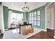 Bright home office featuring hardwood floors, natural light, and custom decor at 4052 Saddle Club S Pkwy, Bargersville, IN 46106
