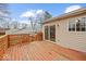 Wooden back deck offering a view of the home's vinyl siding at 4448 Aristocrat Cir, Indianapolis, IN 46235