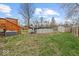 Spacious backyard with an above-ground pool and storage shed at 4448 Aristocrat Cir, Indianapolis, IN 46235