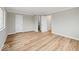 Spacious bedroom showcasing hardwood floors, neutral paint, closet and windows at 4448 Aristocrat Cir, Indianapolis, IN 46235