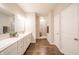 Elegant bathroom featuring double vanity, quartz countertops, and large shower at 4720 W Tradwell Dr, New Palestine, IN 46163