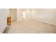 Large room with neutral colored carpet, paint, and trim at 4720 W Tradwell Dr, New Palestine, IN 46163