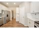 Stainless steel appliances and white subway tile backsplash accentuate the kitchen's functionality and style at 4720 W Tradwell Dr, New Palestine, IN 46163
