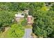 Aerial view of a home surrounded by lush greenery, showcasing the property's privacy and natural beauty at 4754 E 64Th St, Indianapolis, IN 46220