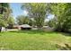 Expansive backyard featuring a garage and house, ideal for recreation and outdoor activities at 4754 E 64Th St, Indianapolis, IN 46220