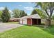 Spacious two-car garage with lawn and a house in the background at 4754 E 64Th St, Indianapolis, IN 46220