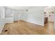 Open-concept living room featuring hardwood floors and neutral color scheme at 4754 E 64Th St, Indianapolis, IN 46220