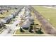 An aerial view of a neighborhood featuring homes with manicured lawns and access to green spaces at 5944 Edelle Dr, Indianapolis, IN 46237