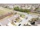 Overhead view of a home nestled in a community with access to a nearby pond and well-kept roadways at 5944 Edelle Dr, Indianapolis, IN 46237