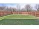 A large, well-maintained backyard features a wooden fence at 5944 Edelle Dr, Indianapolis, IN 46237