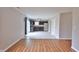 Spacious area with combined kitchen and living area, featuring dark cabinets and stainless steel appliances at 5944 Edelle Dr, Indianapolis, IN 46237