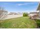 The backyard is enclosed by a white privacy fence and has a storage shed at 7236 Sunset Point Dr, Indianapolis, IN 46259