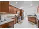 Beautiful kitchen with granite countertops, stainless steel appliances, and wood cabinets at 7236 Sunset Point Dr, Indianapolis, IN 46259