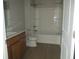 Bathroom featuring wood-look flooring, a bathtub and a vanity at 769 E Pearl St, Whiteland, IN 46184