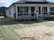 Charming home with inviting front porch and manicured landscaping at 769 E Pearl St, Whiteland, IN 46184