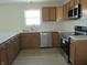 Kitchen featuring stainless appliances, luxury vinyl plank flooring, and a window above sink at 769 E Pearl St, Whiteland, IN 46184