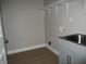Laundry room features a sink and open shelving at 769 E Pearl St, Whiteland, IN 46184