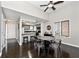 A dining area with a table and chairs next to the kitchen at 8077 Foxchase Dr, Indianapolis, IN 46256