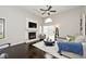 A spacious living room with a fireplace and modern decor at 8077 Foxchase Dr, Indianapolis, IN 46256