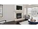 A fireplace with a large flatscreen television above it at 8077 Foxchase Dr, Indianapolis, IN 46256