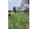 Large backyard, shed in background and green lawn at 839 S Paddock Rd, Greenwood, IN 46143