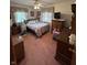 Bedroom featuring vintage decor, ceiling fan and view of yard at 839 S Paddock Rd, Greenwood, IN 46143