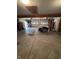 Spacious three car garage with overhead door, concrete floor, and ample storage shelving at 839 S Paddock Rd, Greenwood, IN 46143