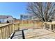 Backyard deck offers a relaxing space to enjoy the outdoors and entertain guests at 888 Streamside Dr, Greenfield, IN 46140