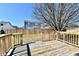 Backyard deck offers a relaxing space to enjoy the outdoors and entertain guests at 888 Streamside Dr, Greenfield, IN 46140