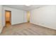 Bright bedroom with neutral carpet, white walls, closet and ensuite bathroom access at 888 Streamside Dr, Greenfield, IN 46140