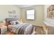 Cozy bedroom featuring stylish decor and a window providing natural light at 888 Streamside Dr, Greenfield, IN 46140
