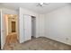 Cozy bedroom featuring neutral carpet, white walls, closet, and a ceiling fan at 888 Streamside Dr, Greenfield, IN 46140