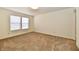 Bright bedroom with plush carpet, two windows for plenty of natural light at 888 Streamside Dr, Greenfield, IN 46140