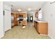 Kitchen features stainless steel appliances, oak cabinets, and neutral flooring at 888 Streamside Dr, Greenfield, IN 46140