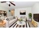 Staged living room featuring a modern design with a soft white palette at 888 Streamside Dr, Greenfield, IN 46140