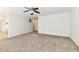 Spacious living room with carpeted flooring, ceiling fan at 888 Streamside Dr, Greenfield, IN 46140