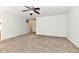 Spacious living room featuring carpet and ceiling fan at 888 Streamside Dr, Greenfield, IN 46140