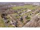 Wide aerial showcasing the property's expansive lot and surrounding neighborhood at 9531 Prospect St, Indianapolis, IN 46239