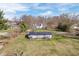 High aerial view of a charming property with a well-maintained lawn and a barn at 9531 Prospect St, Indianapolis, IN 46239