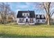 Charming two-story home with a classic design and a well-maintained front yard at 9531 Prospect St, Indianapolis, IN 46239