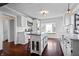 Bright kitchen featuring white cabinets, stainless steel appliances, and a butcher block island at 9531 Prospect St, Indianapolis, IN 46239