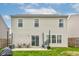 A cozy outdoor patio in a big backyard is perfect for hosting and grilling at 1012 Balto Dr, Shelbyville, IN 46176