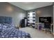 Stylized bedroom with a window, TV, and a full-sized bed that offers a relaxing retreat at 1012 Balto Dr, Shelbyville, IN 46176