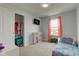 Bright bedroom with a full-sized bed, closet, and a cozy window nook that offers a relaxing retreat at 1012 Balto Dr, Shelbyville, IN 46176