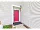 Close-up of the red front door, enhancing curb appeal with its inviting color and clean design at 1012 Balto Dr, Shelbyville, IN 46176