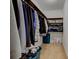 Organized walk-in closet with shelving, hanging rods, and ample storage space, perfect for efficient organization at 1012 Balto Dr, Shelbyville, IN 46176