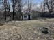 Backyard view featuring an outbuilding on a clear lot at 10131 Nassau Ln, Indianapolis, IN 46229